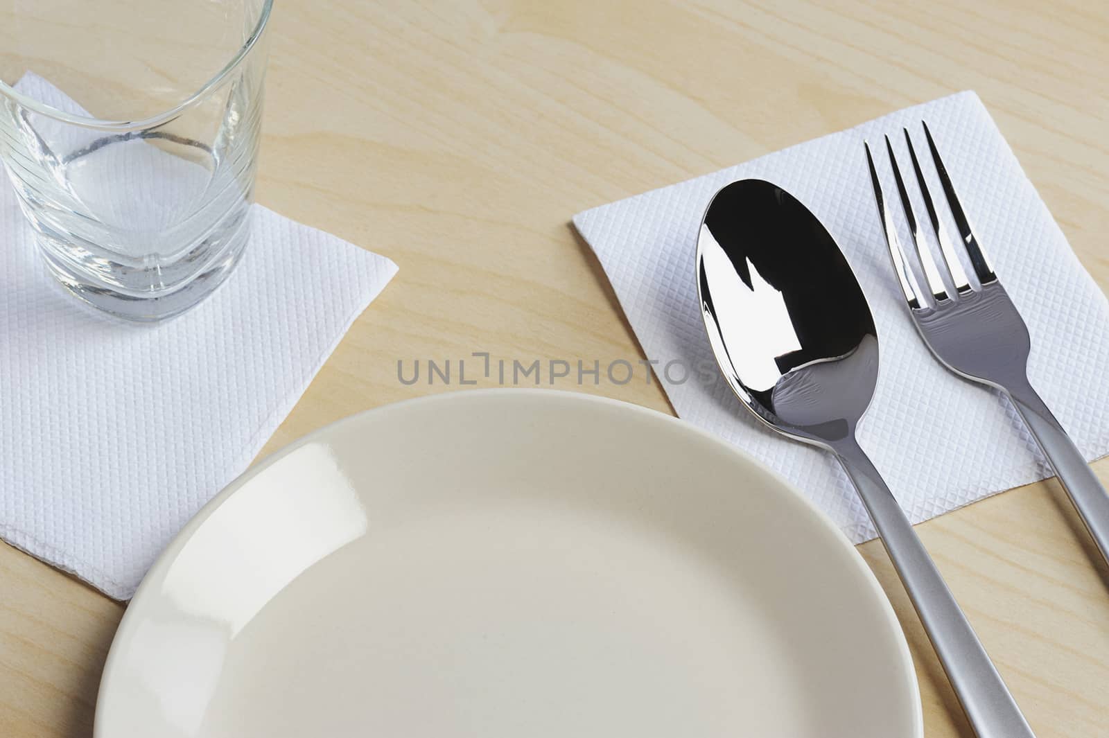 Set empty plate and glass  on wood table