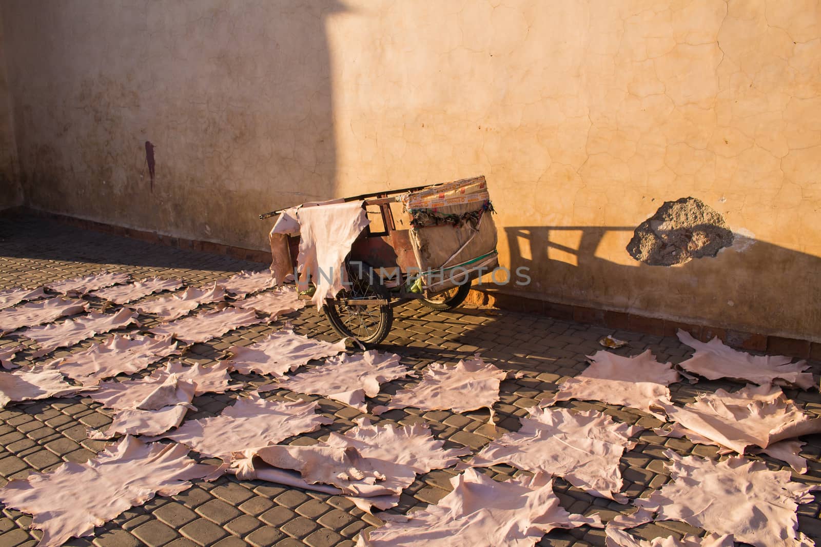 Street with a cart and leather to dry, Marrakesh, Morocco
 by YassminPhoto