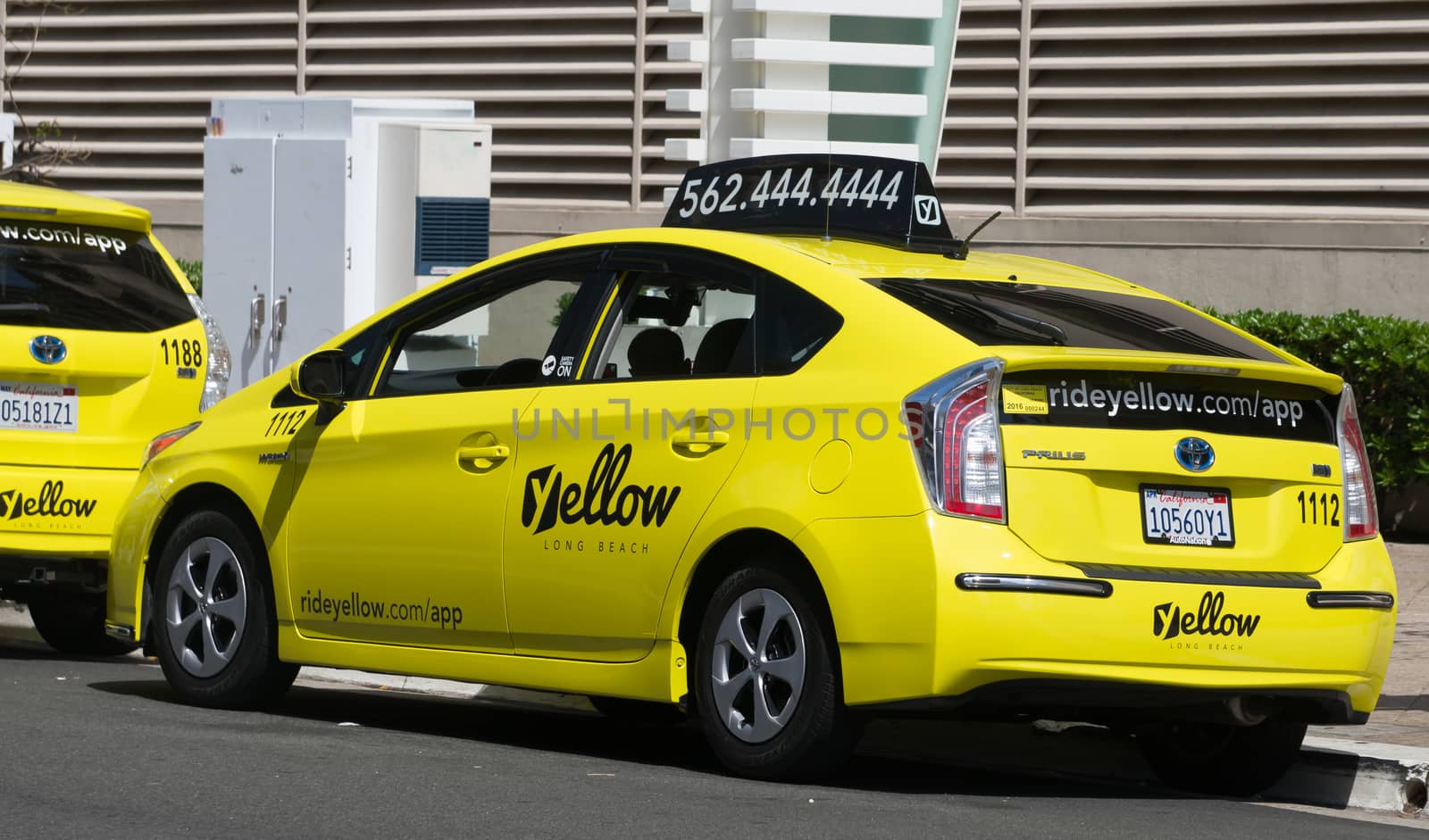 LONG BEACH, CA/USA - MARCH 19, 2016: California Yellow Cab taxi exterior and logo. California Yellow Cab is a cab company in California.