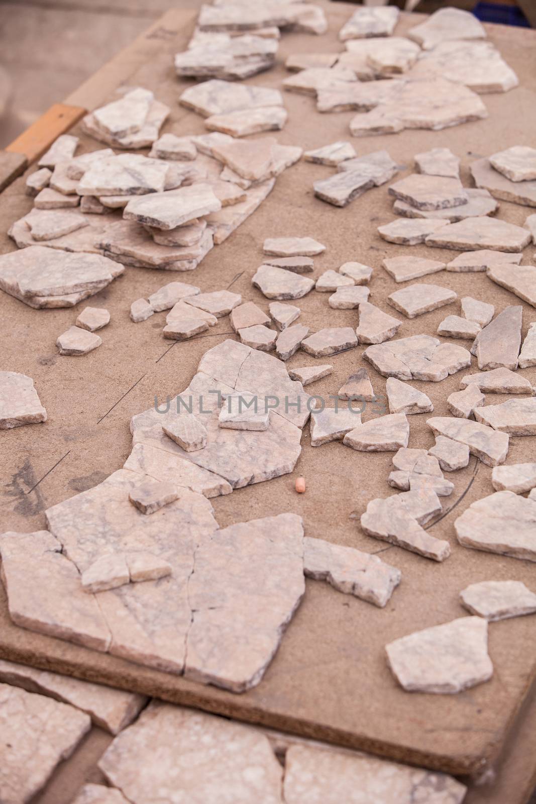 Reconstruction of marble tiles in progress at archeological site in Turkey