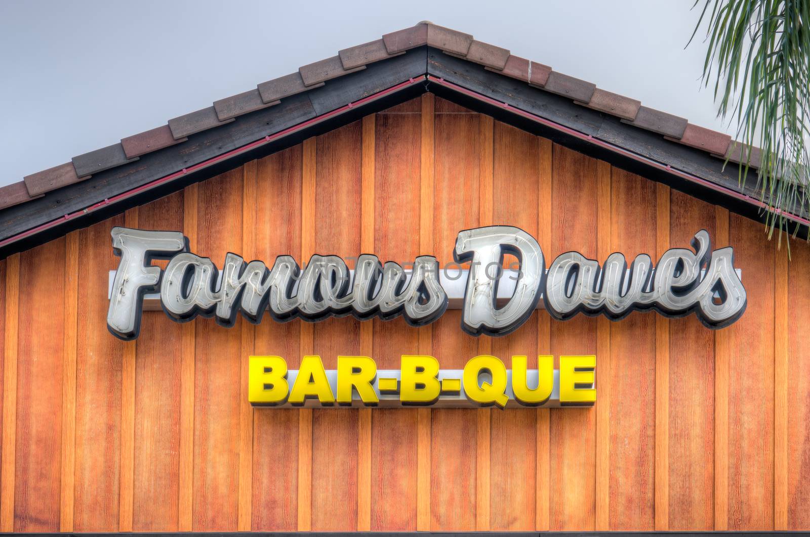 LONG BEACH, CA/USA - MARCH 19, 2016: Famous Dave's restaurant exterior and logo. Famous Dave's of America is a chain of barbecue restaurants.