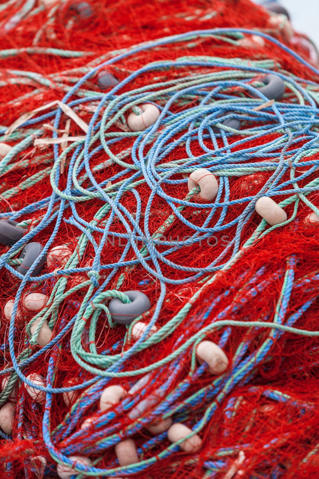 Colorful fishing nets and floats at seaside near Troy in Turkey