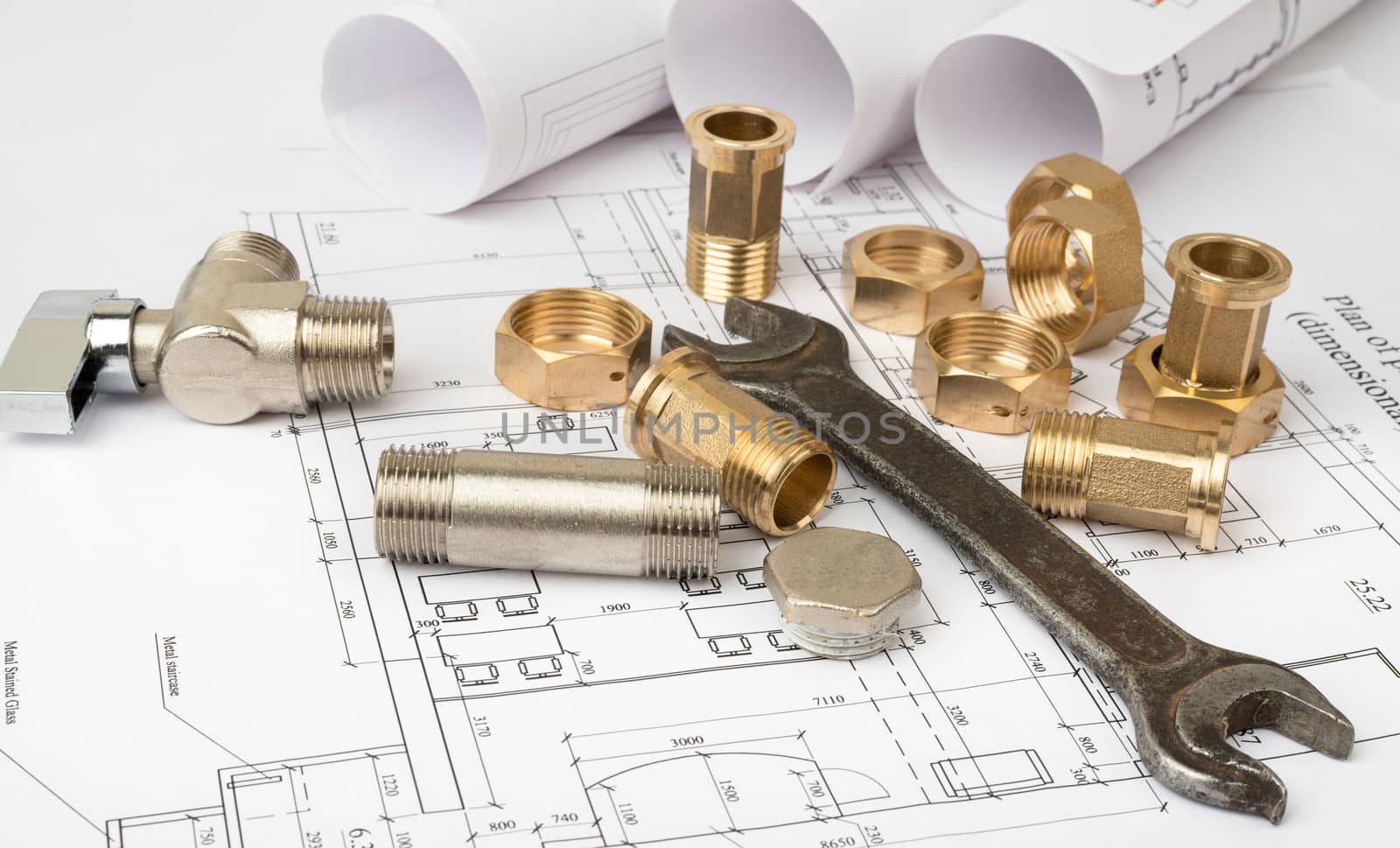 Architecture plan with plunger pins and turn-screw, closeup. Building concept