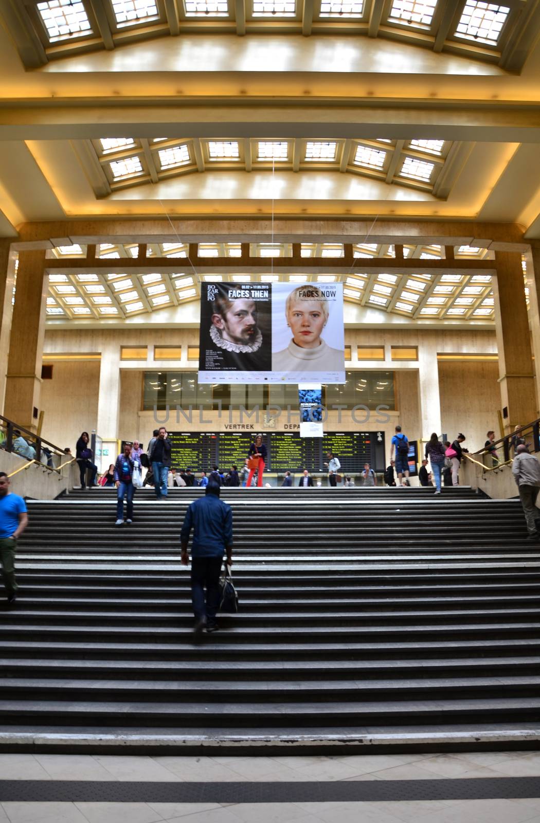 Brussels, Belgium - May 12, 2015: Travellers in the main lobby of Brussels Central Train Station on May 12, 2015 in Brussels , Belgium.
