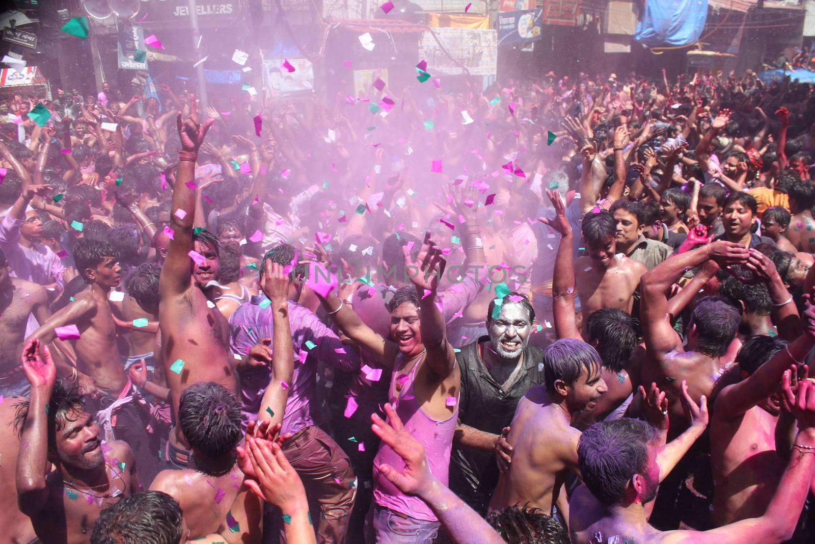 INDIA, Allahabad :  Indian people celebrate the Holi festival in Allahabad on March 23, 2015. Holi, the Hindu spring festival or 'Festival of Colours' is celebrated with coloured powder and water and marks the end of winter and the beginning of spring. 