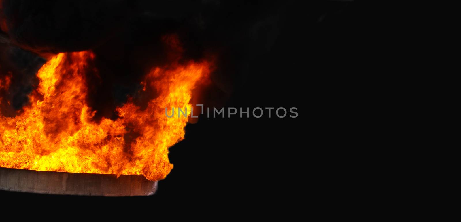Blazing flames fire over black white background