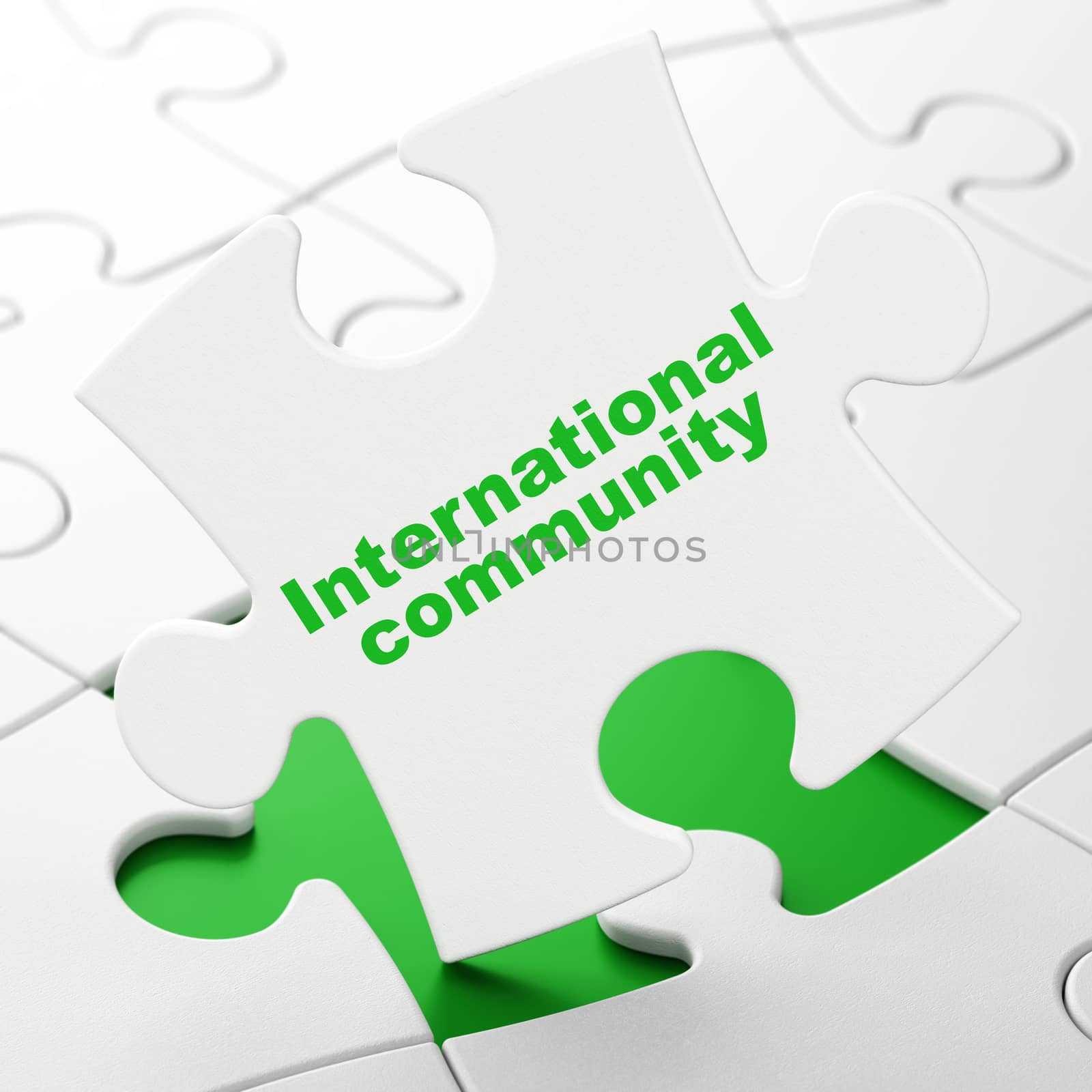 Political concept: International Community on puzzle background by maxkabakov