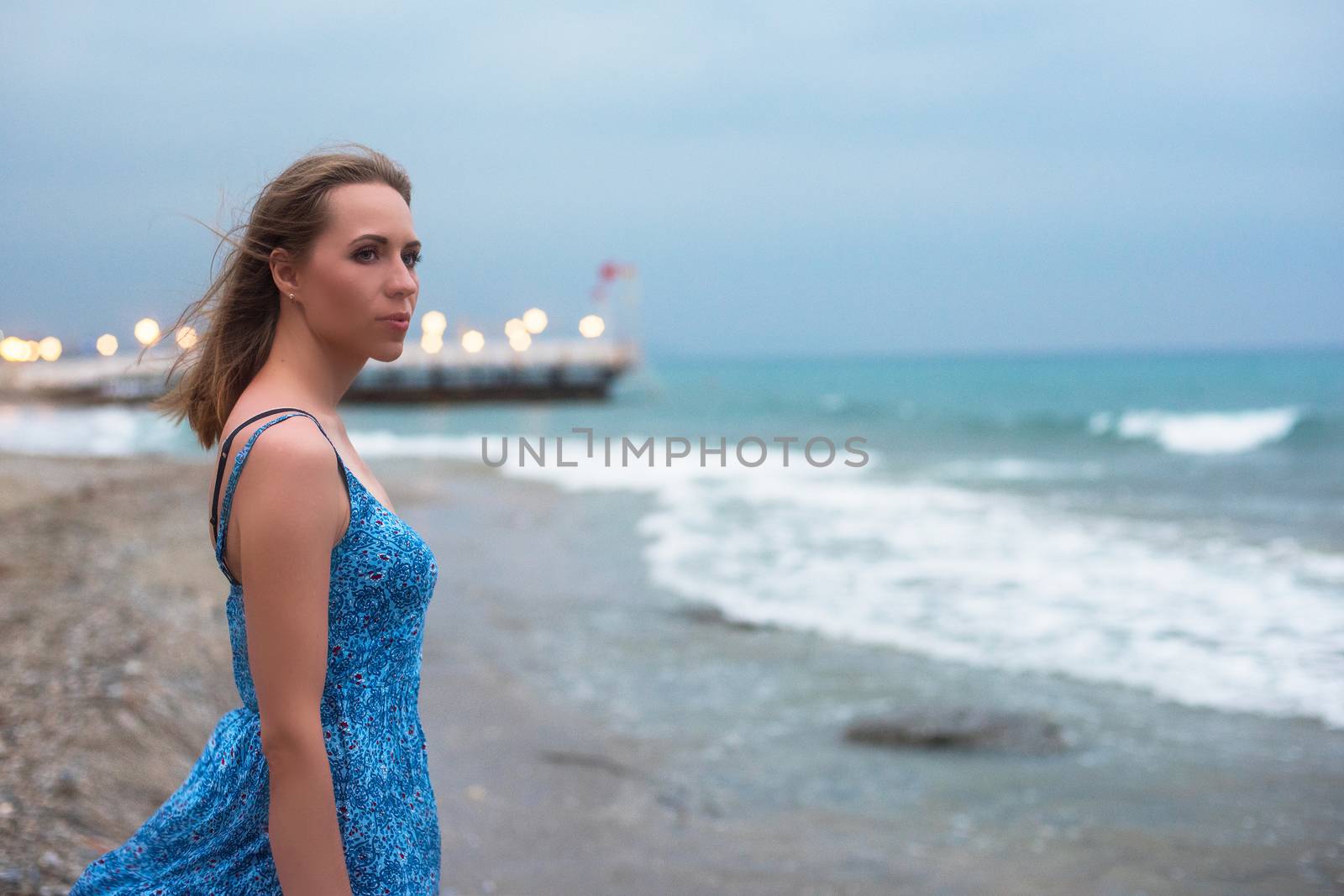 beautiful woman on the beach by rusak