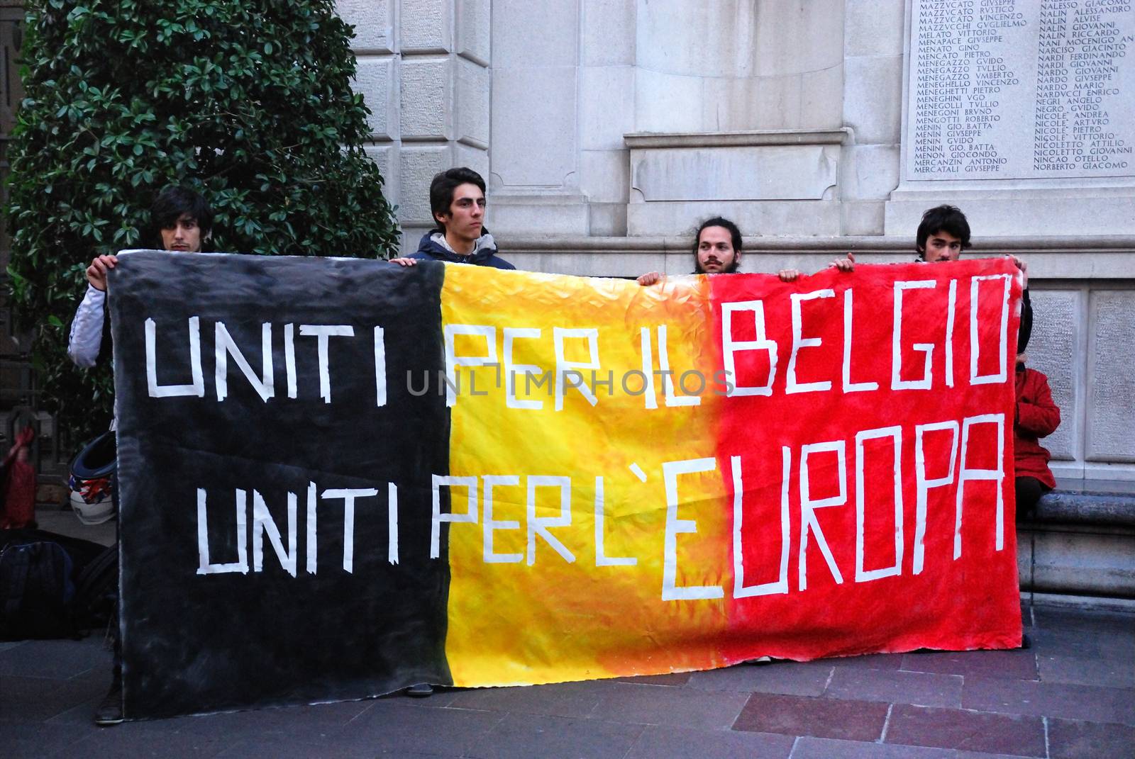 ITALY, Padova: Members of a flash mob in Padova, Italy hold a sign on March 23, 2016 as a show of solidarity with the victims of the terror attacks in Brussels, Belgium the day previous. On March 22, a series of bombings killed at least 30 people and injured hundreds of others, both at Zaventem airport and at Maelbeek metro station. The Islamic State terror group has since claimed responsibility for the attack.