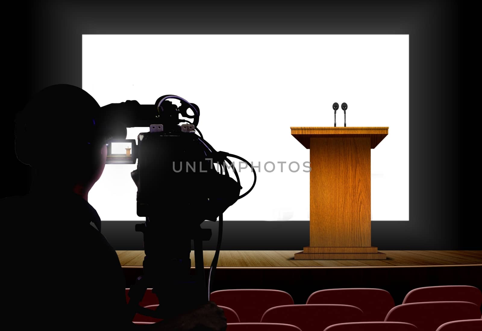 Cameraman shooting a podium with blank screen