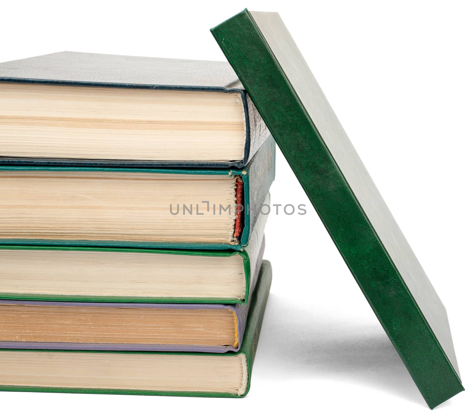 Pile of books isolated on white background, closeup