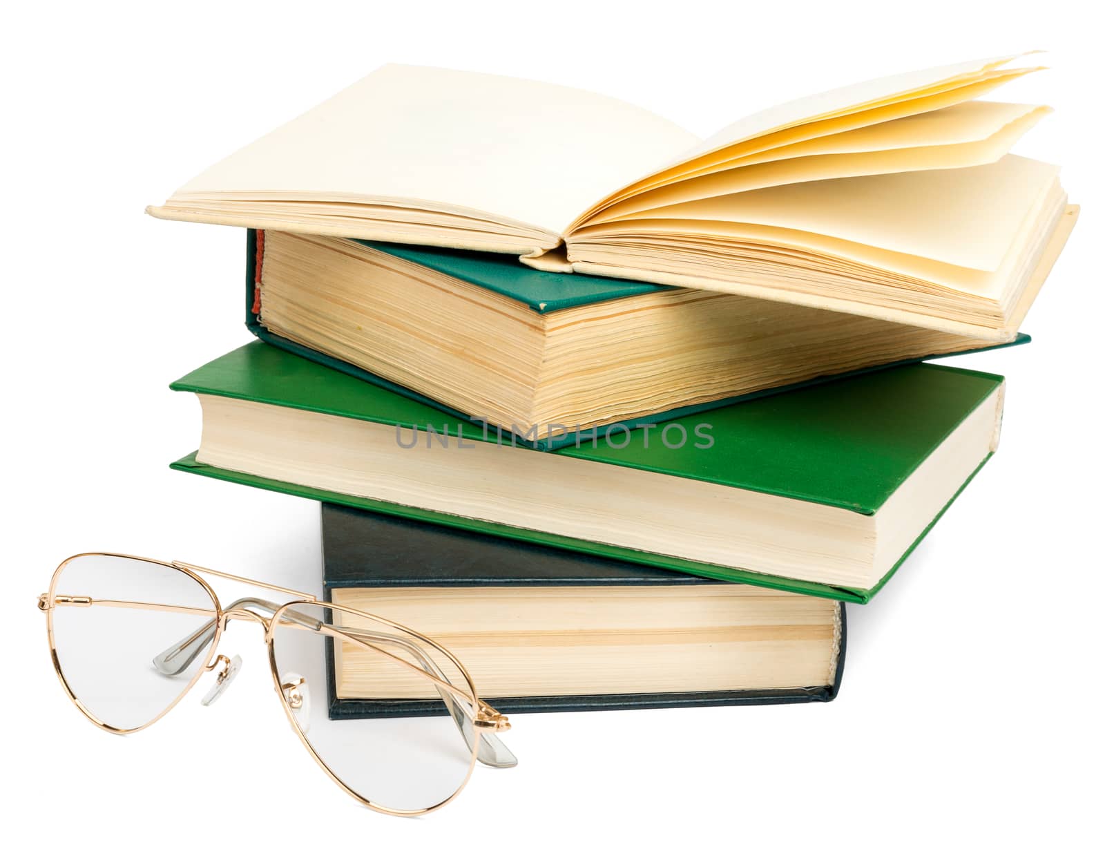 Open book with eyeglasses isolated on white background