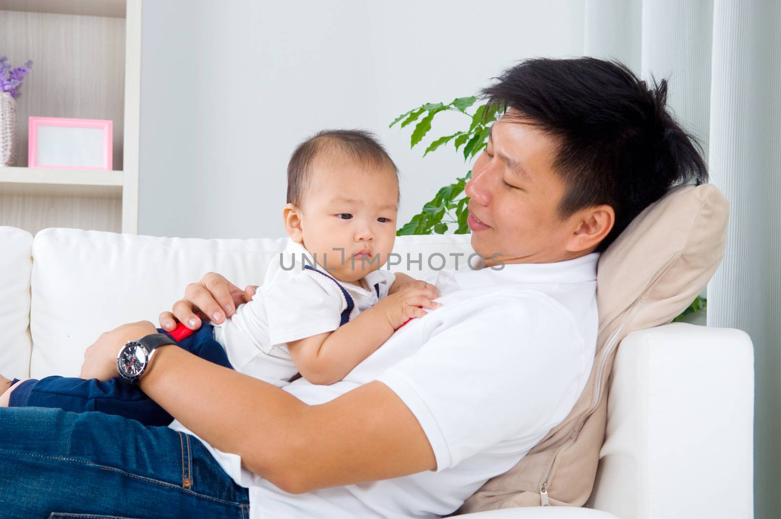 Asian father and baby