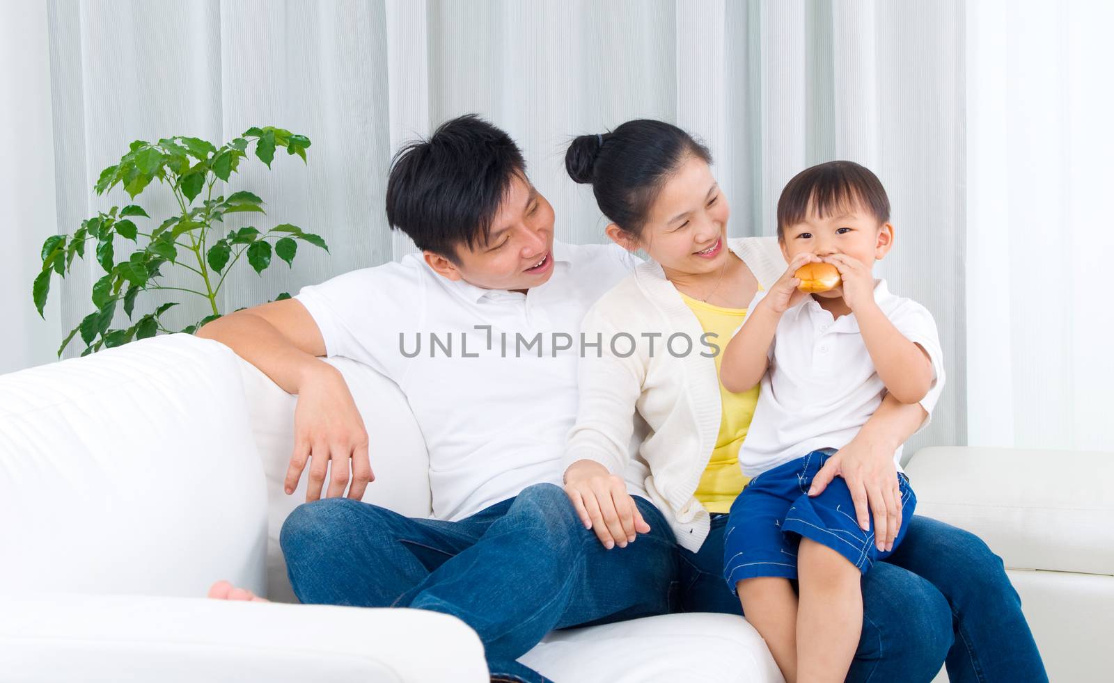 Indoor portrait of asian family