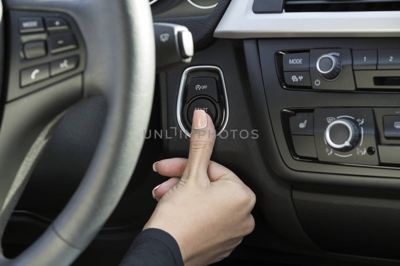 close-up of a girl's hand on the dashboard in a car