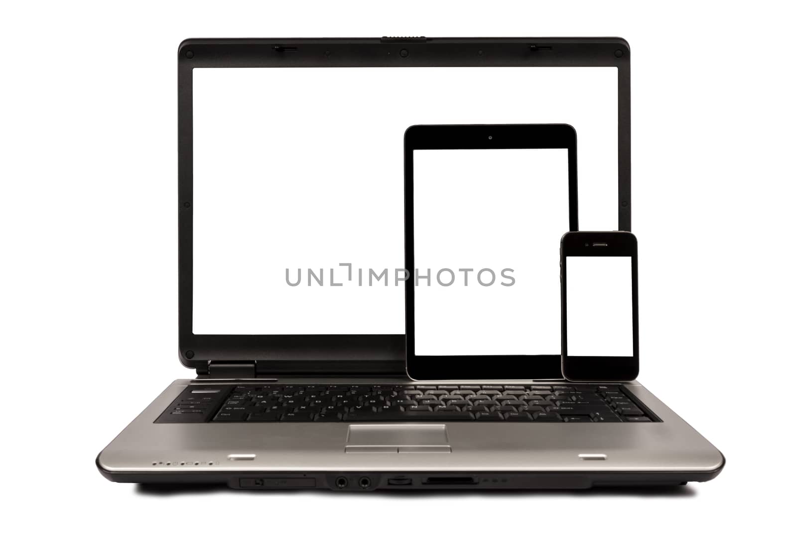 Group of modern devices..Laptop computer, digital tablet and mobile phone. All with blank screens for your copy.