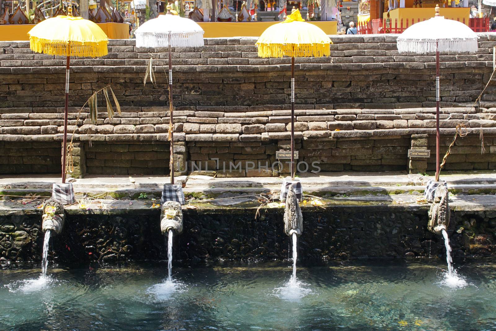 BALI, INDONESIA - DECEMBER 01, 2015: Holy springs of Pura Tirta Empul, one of the sights of Bali on December 01, 2015 in Bali, Indonesia