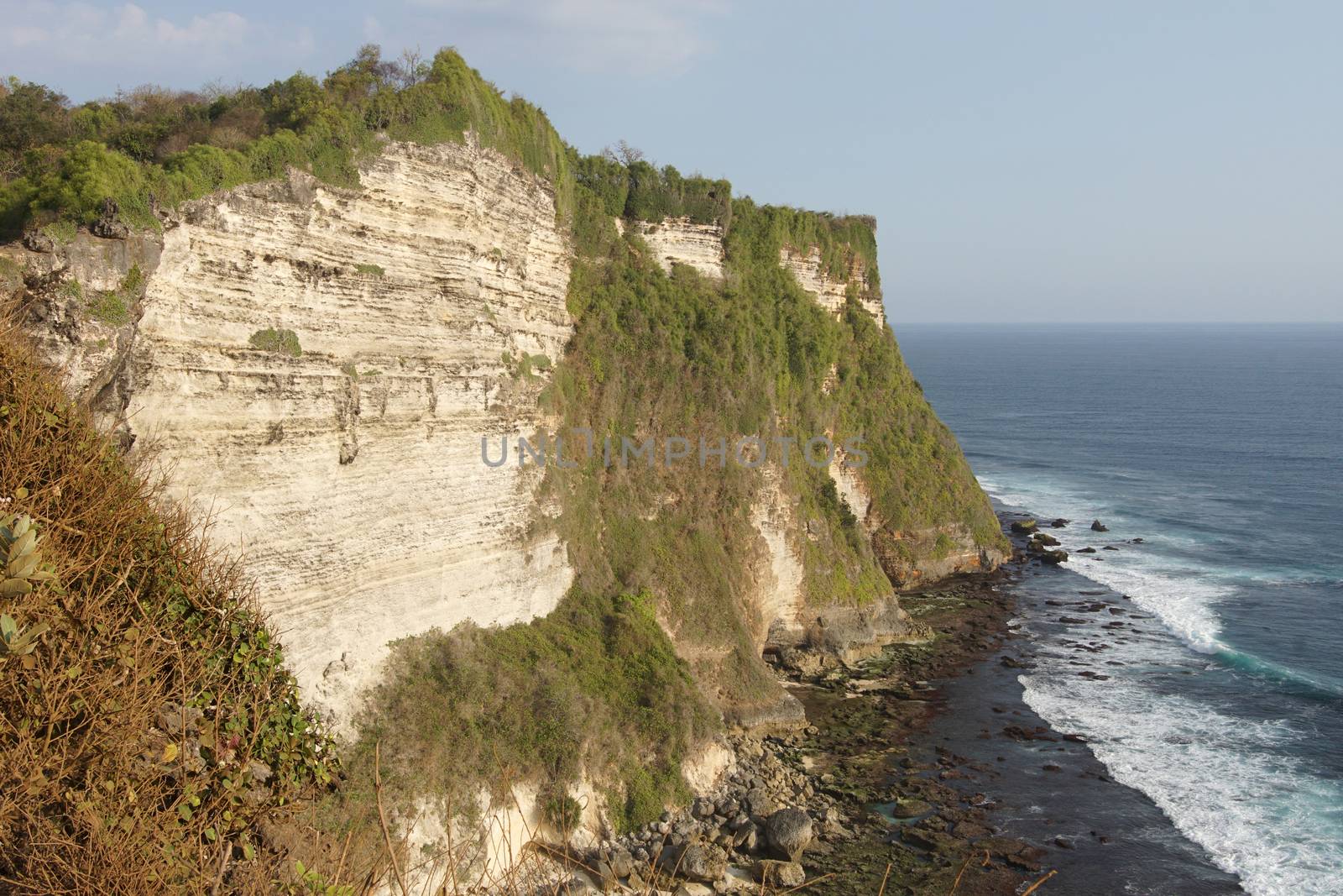 Cliff coast close to Uluwatu Temple, Bali, Indonesia