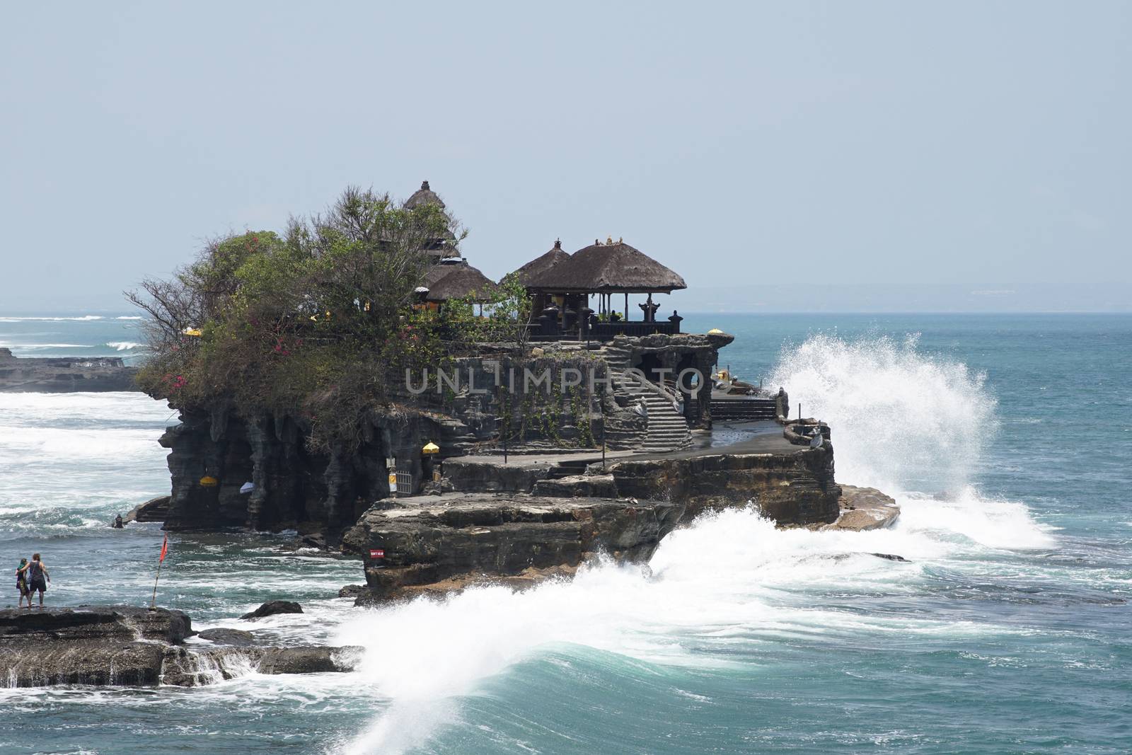 BALI, INDONESIA - SEPTEMBER 29, 2015: Tanah Lot temple during tidal water on September 29, 2015 in Bali, Indonesia
