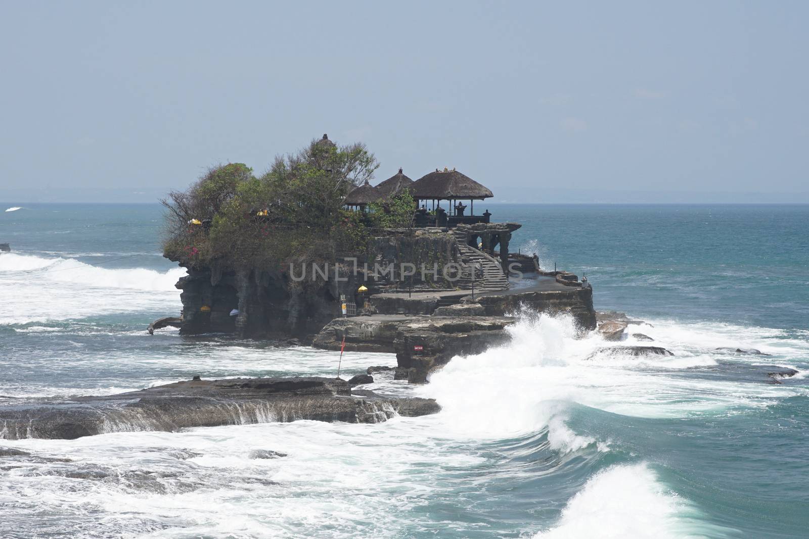 BALI, INDONESIA - SEPTEMBER 29, 2015: Tanah Lot temple during tidal water on September 29, 2015 in Bali, Indonesia