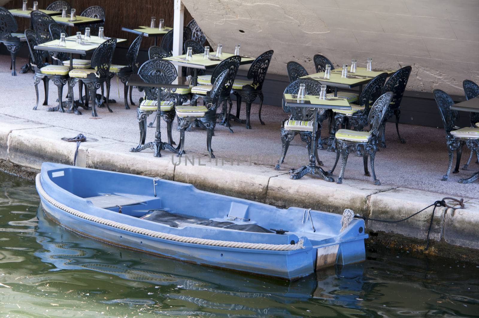 Very quiet restaurant near the river with boat France Provence Mediterranee