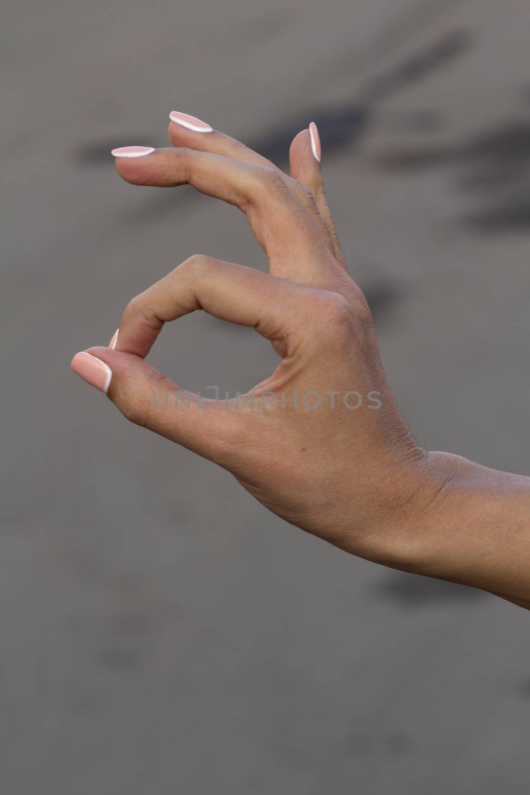 girl does the pointing hand movement