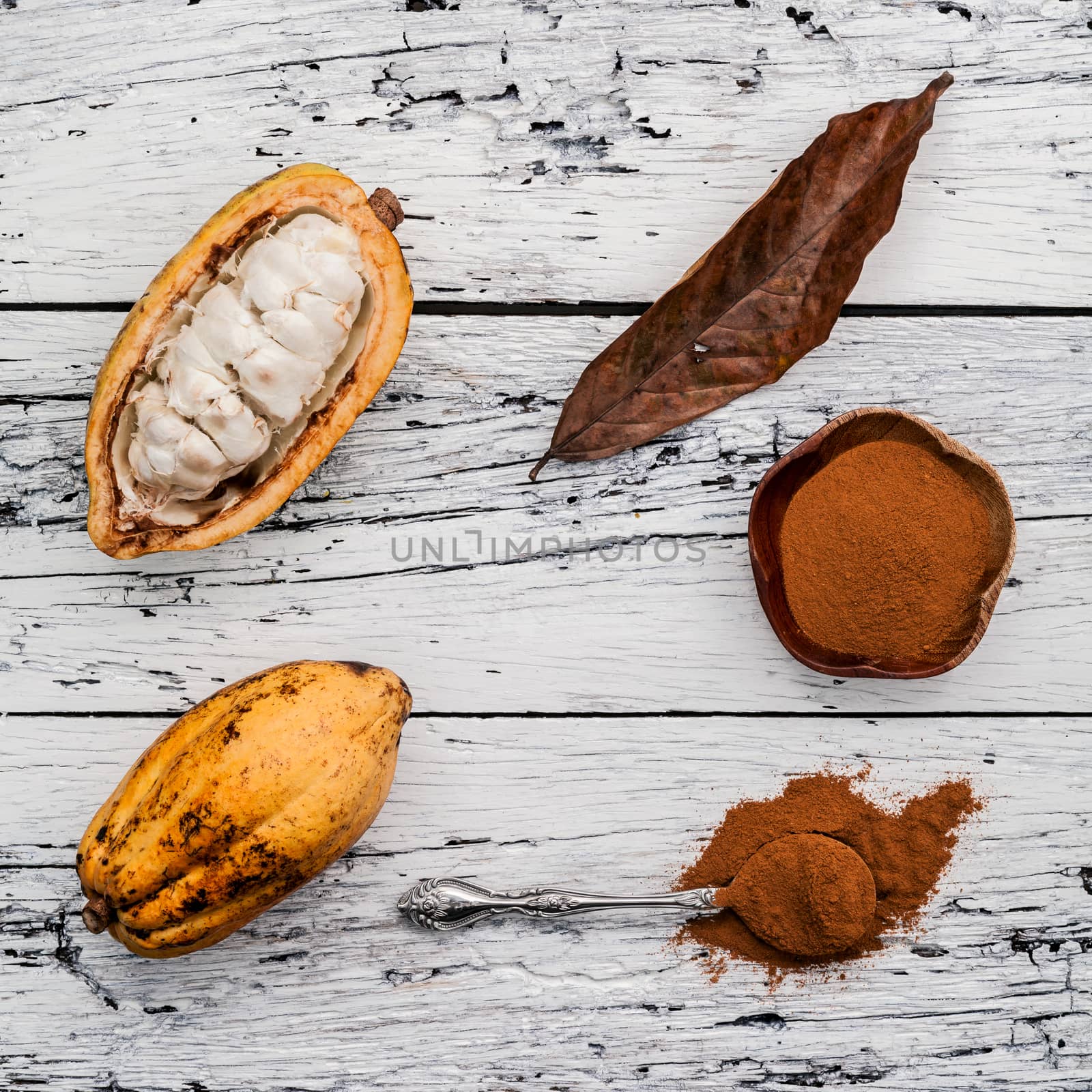 Ripe Indonesia's cocoa  setup on rustic wooden background. by kerdkanno