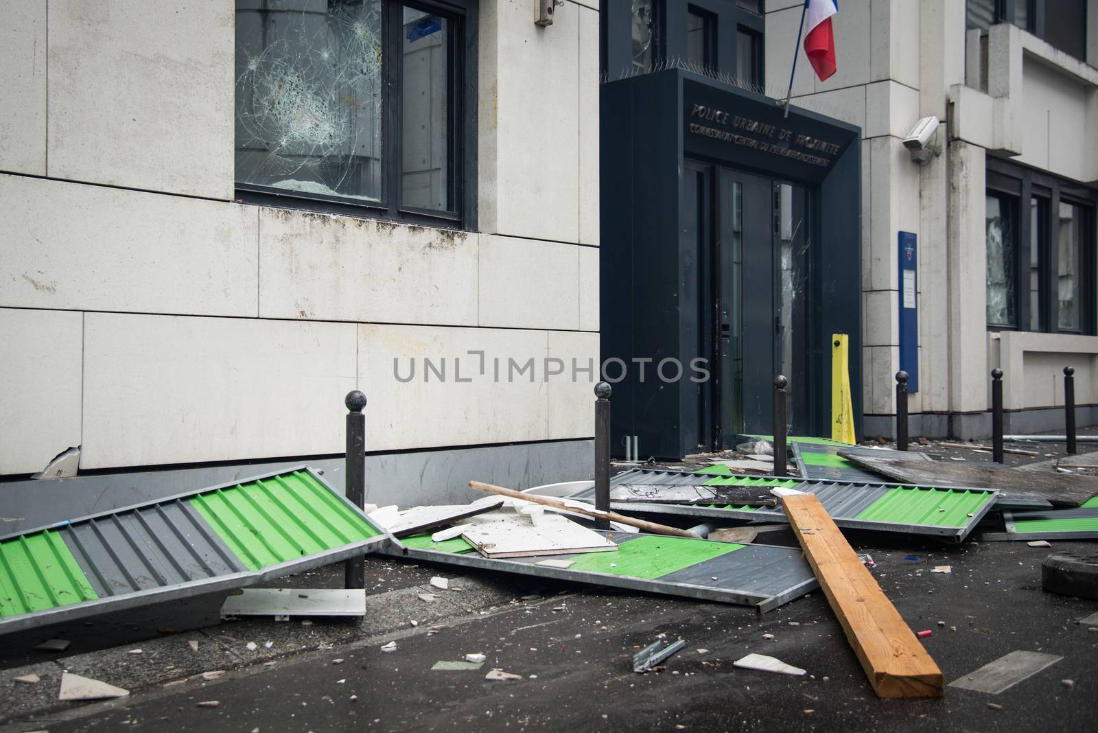 FRANCE, Paris: A police station of Paris 19th arrondissement is seen damaged, on March 25, 2016, after young people throw projectile against it, in a sign of protest against alledged police violence on a student during a demonstration of youths against the French labour law reform.A video of a policeman punching a student went viral on social media on March 24, and an enquiry has been opened into the incident. Tens of thousands of students protesting labour reforms took to the streets across France on March 24, torching cars in Paris and clashing with riot police who responded with tear gas and made more than 30 arrests.