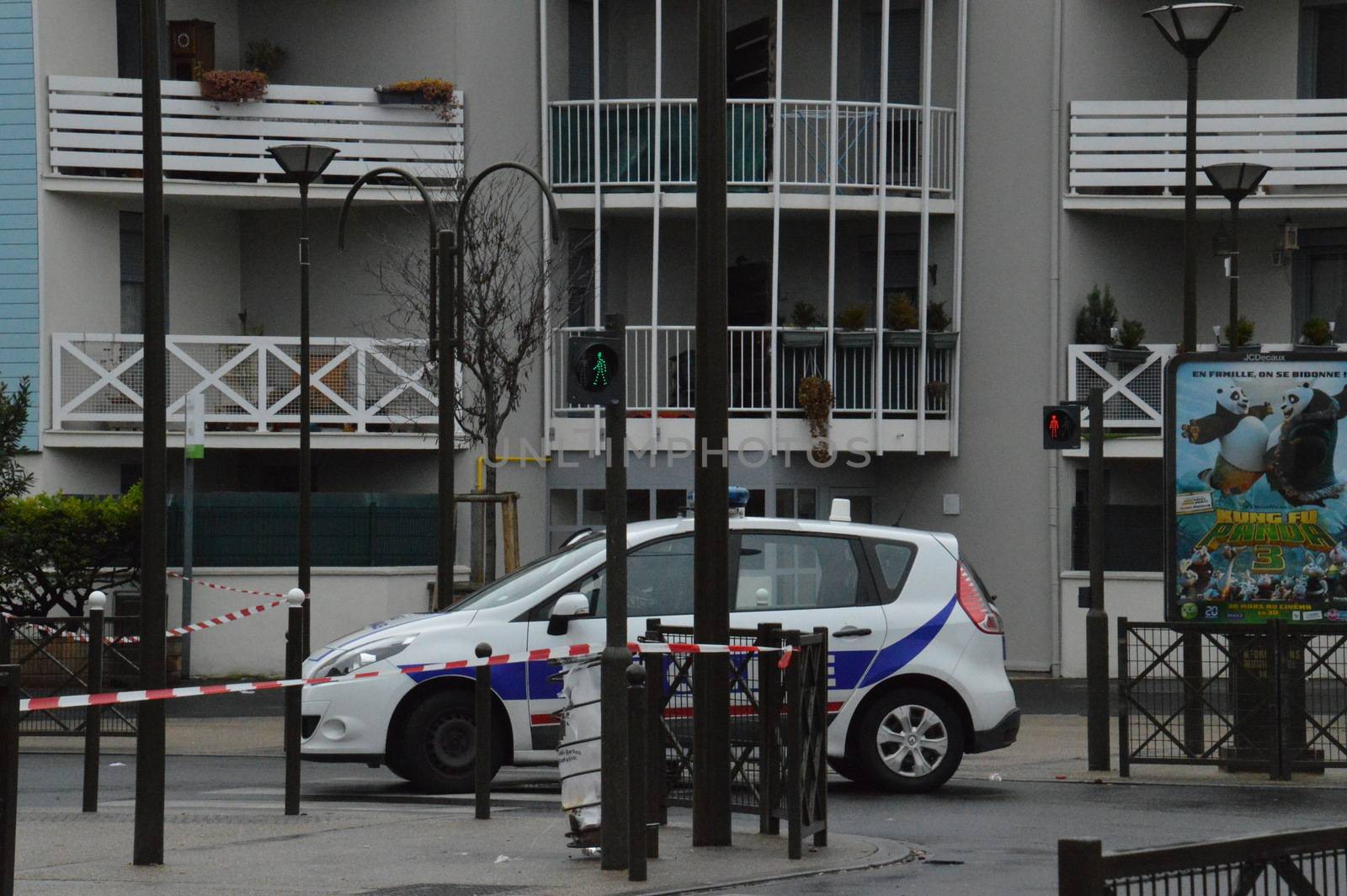 FRANCE, Argenteuil: A police car patrol after a raid in the Argenteuil neighbourhood northwest of Paris on March 25, 2016. French Interior Minister Bernard Cazeneuve said police had arrested a suspect in the Paris area today who was in the advanced stages of a plot to attack France.