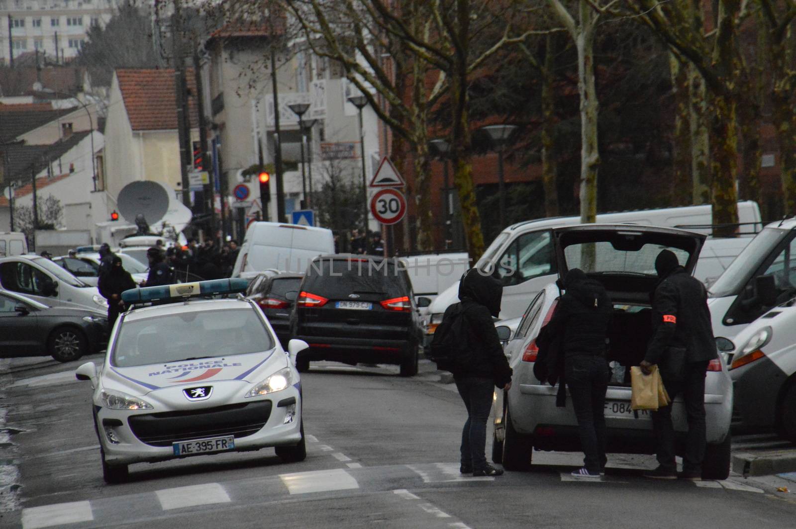 FRANCE, Argenteuil: Police officers walk in a street after a raid in the Argenteuil neighbourhood northwest of Paris on March 25, 2016. French Interior Minister Bernard Cazeneuve said police had arrested a suspect in the Paris area today who was in the advanced stages of a plot to attack France.