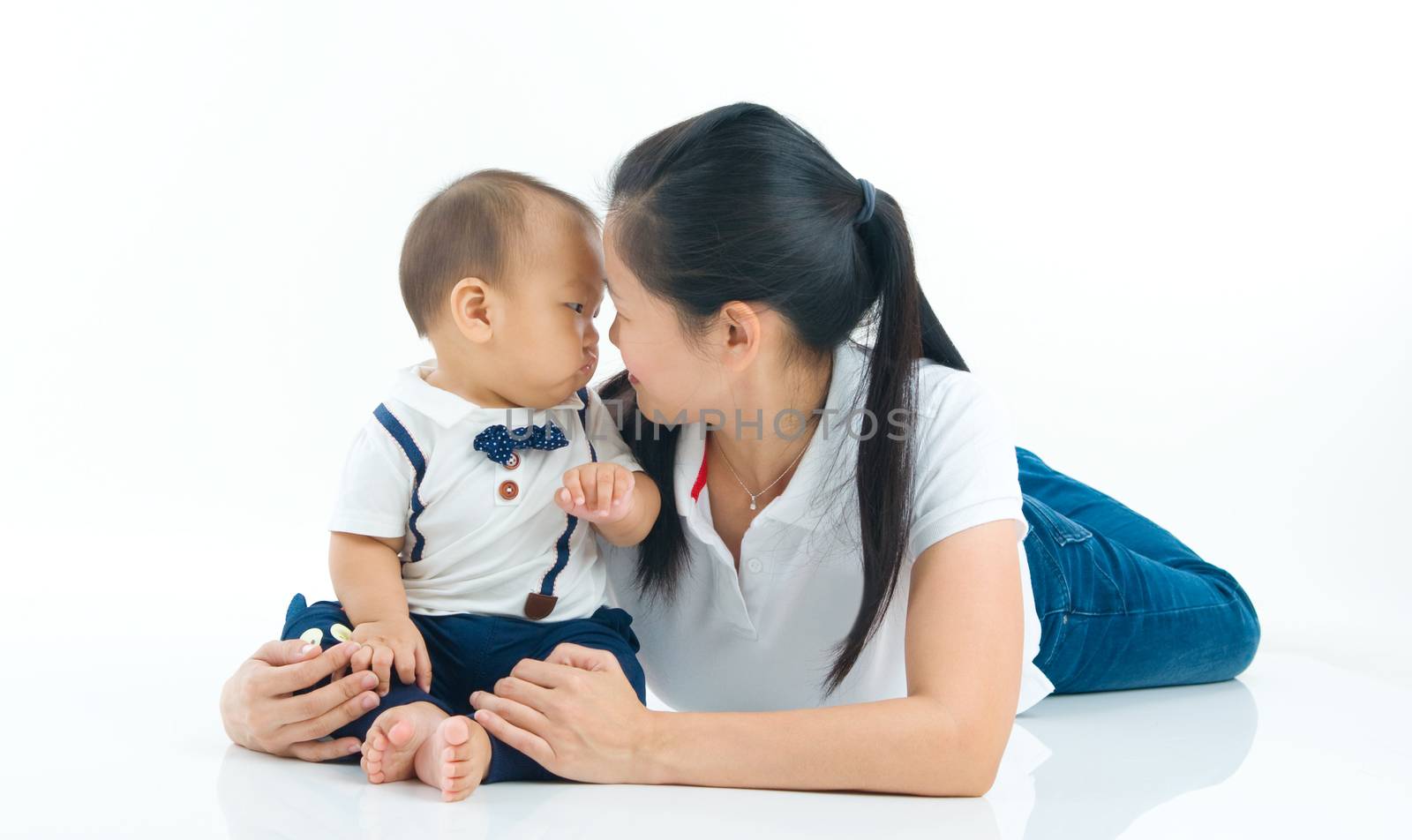 Asian mother and baby indoor portrait