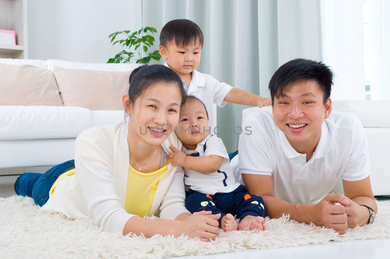 Indoor portrait of asian family