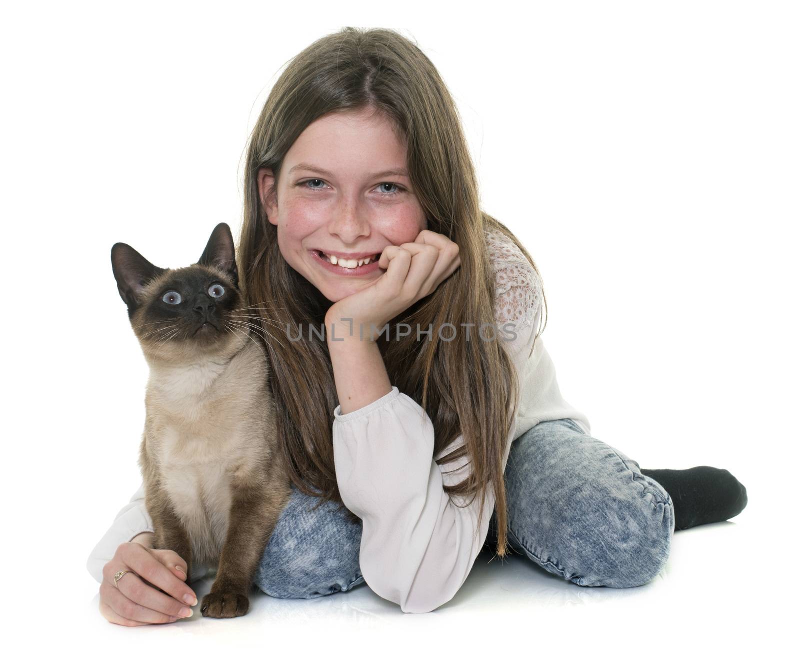 child and siamese cat in front of white background