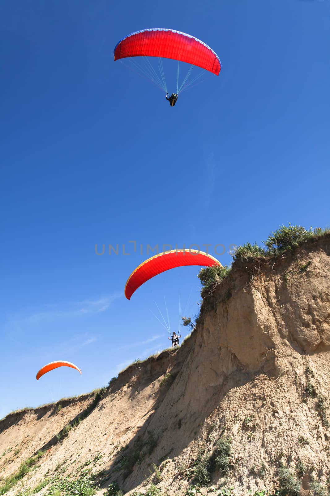 paraglider on the blue sky