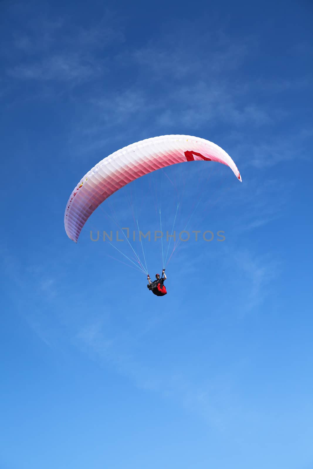 paraglider on the blue sky