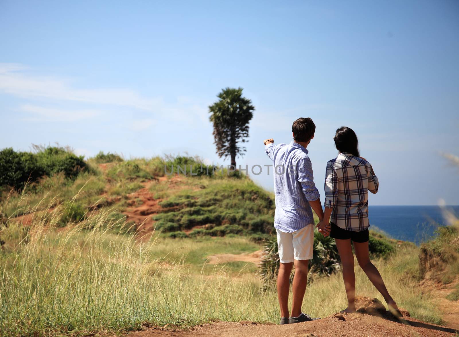 Young couple by the sea by ALotOfPeople