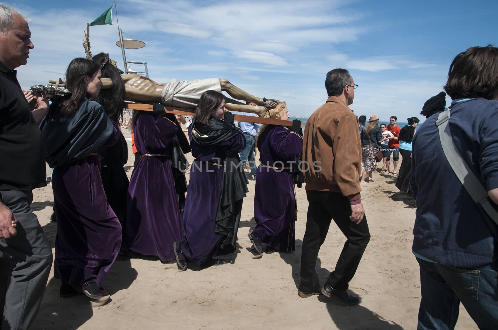 SPAIN, Valencia: Catholics march on their way to hold a beachside prayer for the dead in Valencia, Spain on Good Friday, March 25, 2016. The ceremony comes at the end of the Holy Week, just days before Easter Sunday.