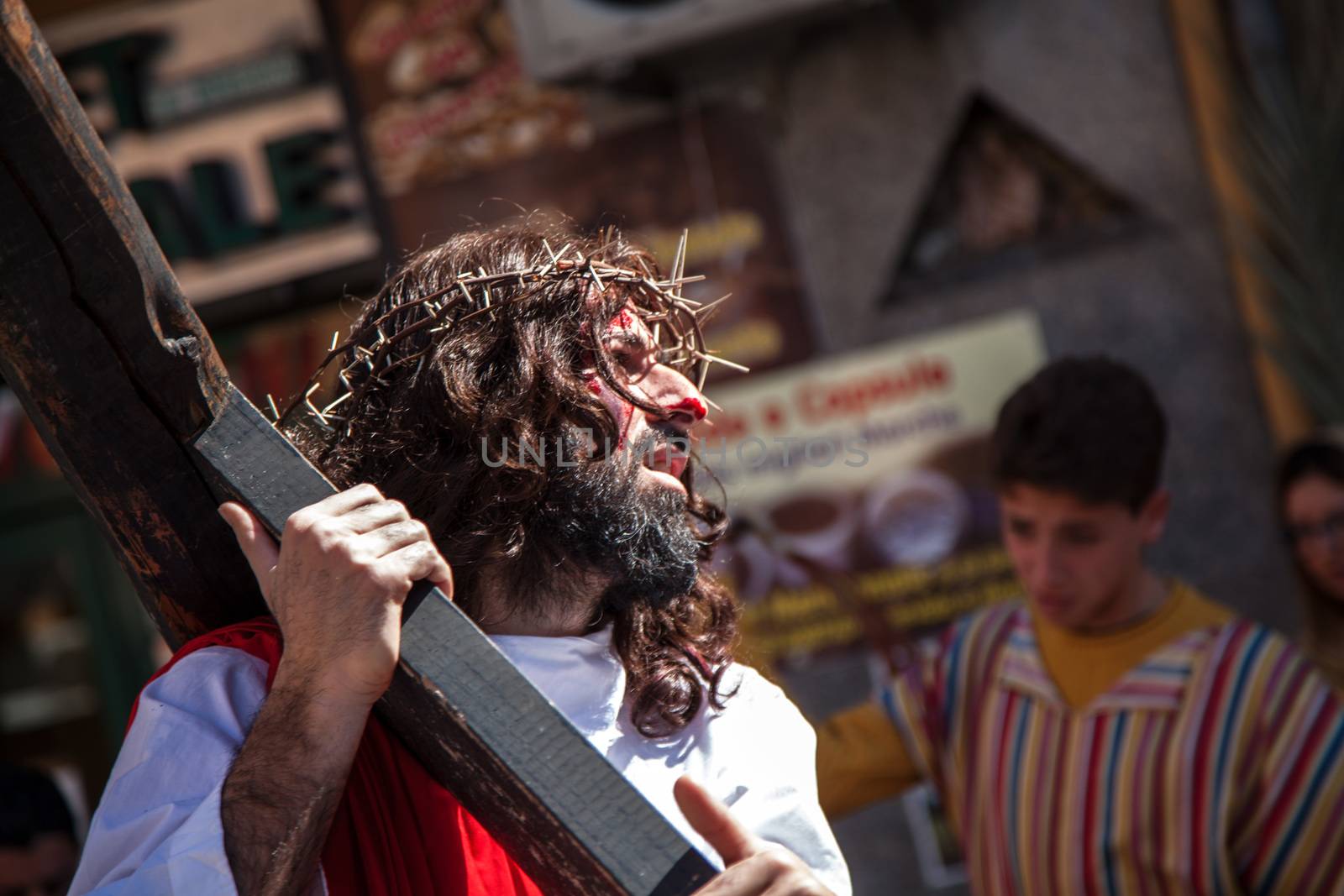 ITALY, Palermo: A man poses as Jesus Christ on Good Friday, March 25, 2016, during the traditional procession of mysteries (processione del misteri) in Palermo, Italy. The procession comes at the end of the Holy Week, just days before Easter Sunday.