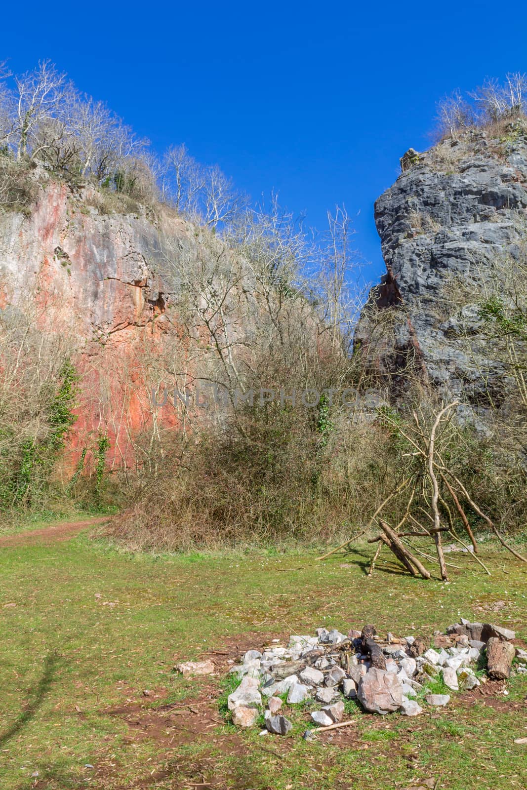 Disused quarry used for camping and shelter building.