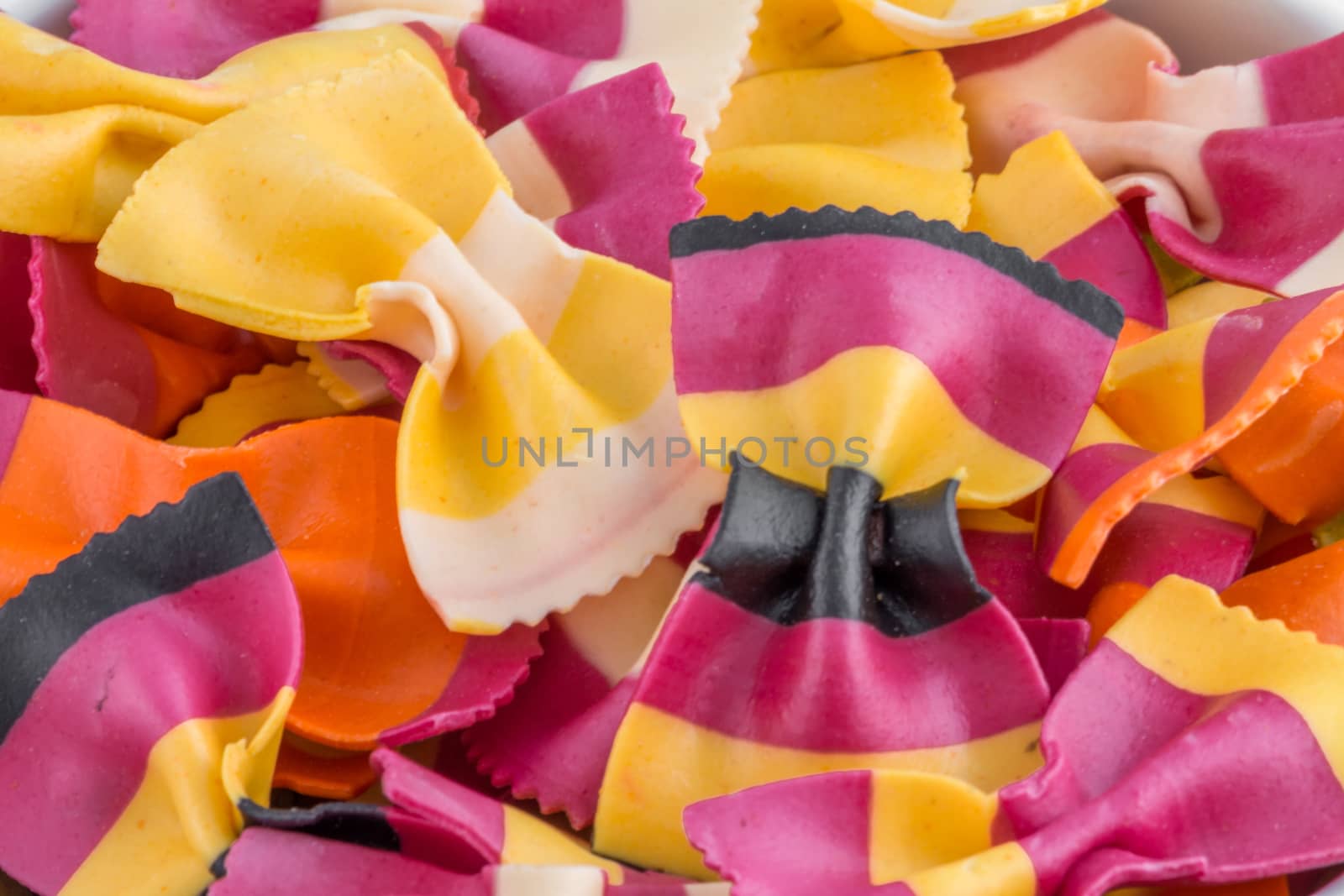 Close up of some colourful pasta bows