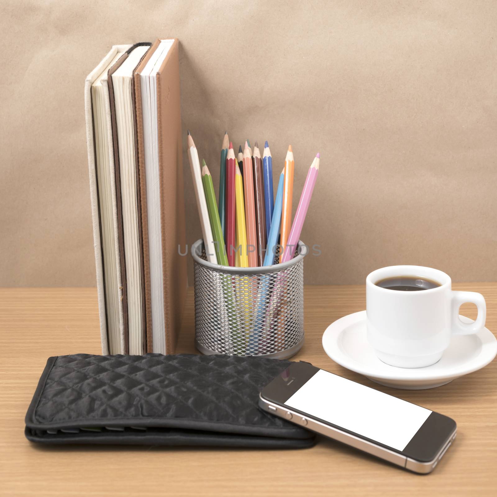 office desk : coffee with phone,stack of book,wallet,color box by ammza12