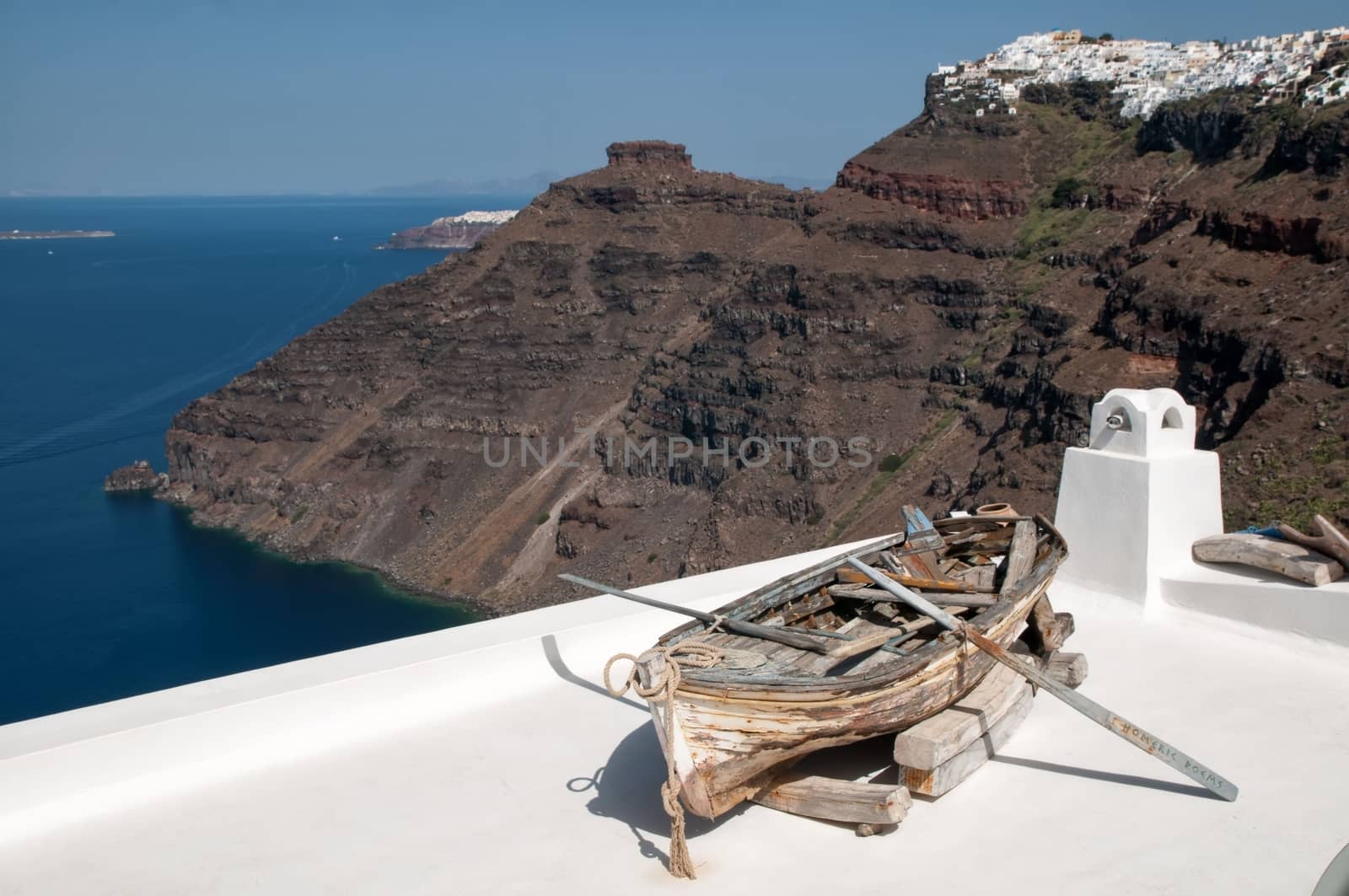 Romantic terrace amid Santorini caldera, Greece