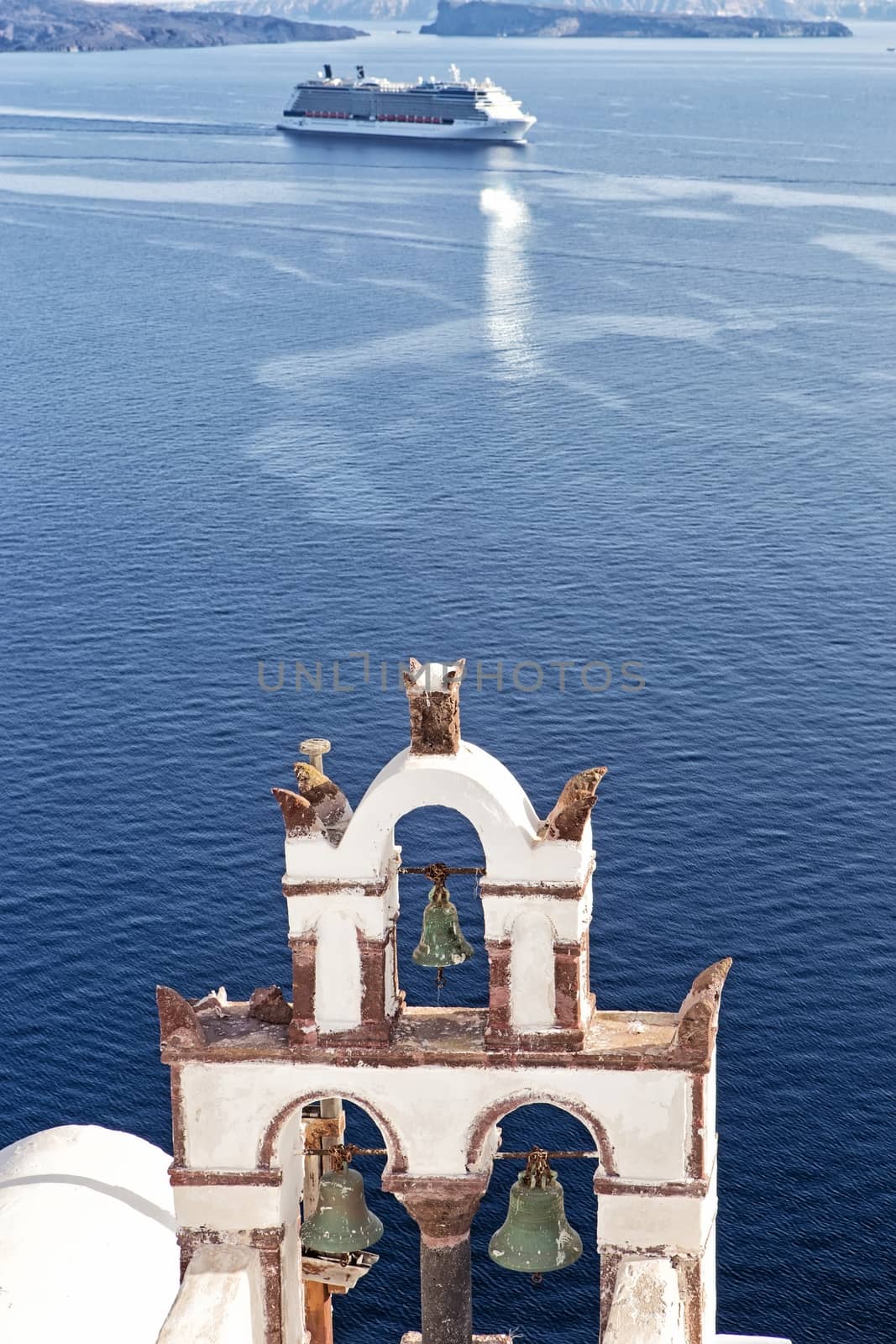 Vintage belfry in Oia, Santorini, Greece