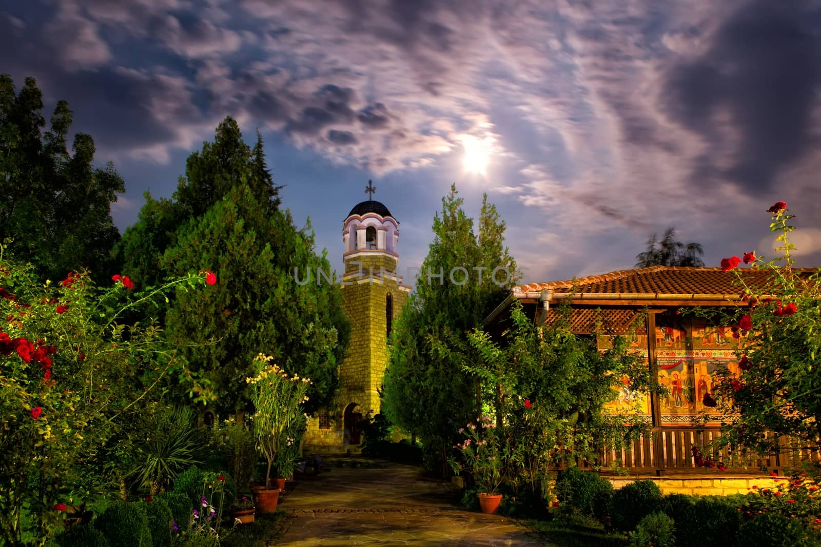 Old christian monastery at summer night