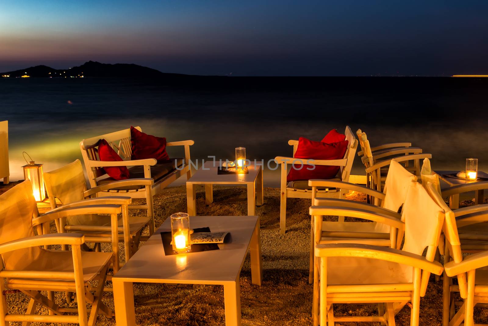 PAROS, GREECE: Cozy restaurant at night in Naussa, Paros by mitakag
