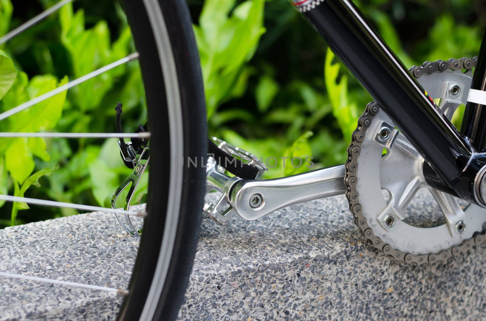 Close up of bicycle pedal  by siraanamwong