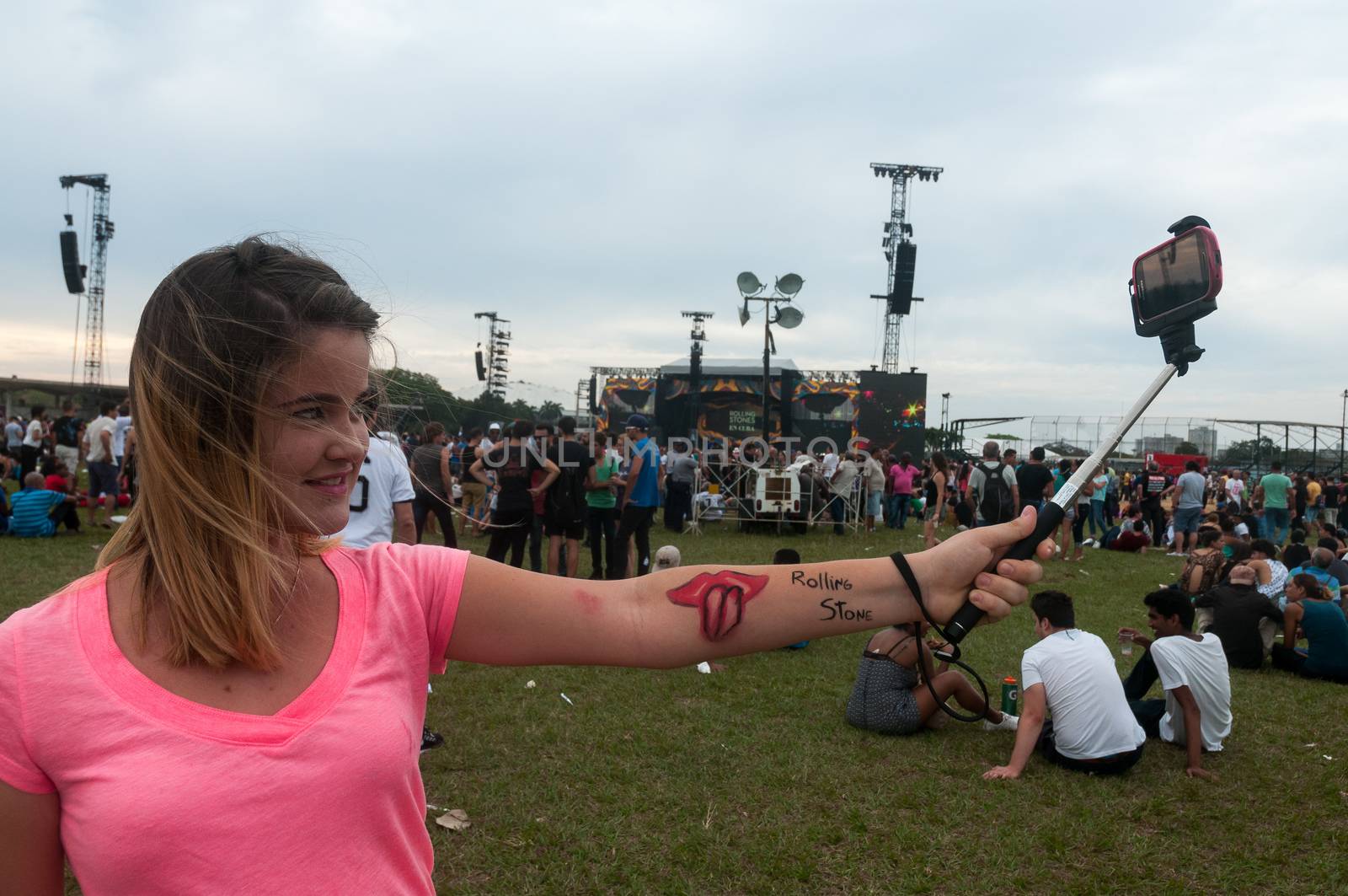 CUBA, Havana: Rolling Stones fans wait for the start of a free concert on March 25, 2016 in Havana, Cuba. Thousands of fans waited for the Rolling Stones to play for the first time in Cuba, after the music was once banned by the government.