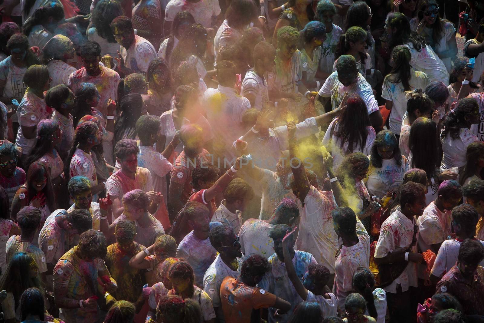 MALAYSIA, Kuala Lumpur: Revellers dance and spray colored powder during the Holi Festival in Kuala Lumpur on March 26, 2016. Holi, also called the Festival of Colours, is a popular Hindu spring festival observed in India, Malaysia and other countries at the end of the winter season on the last full moon day of the lunar month. 