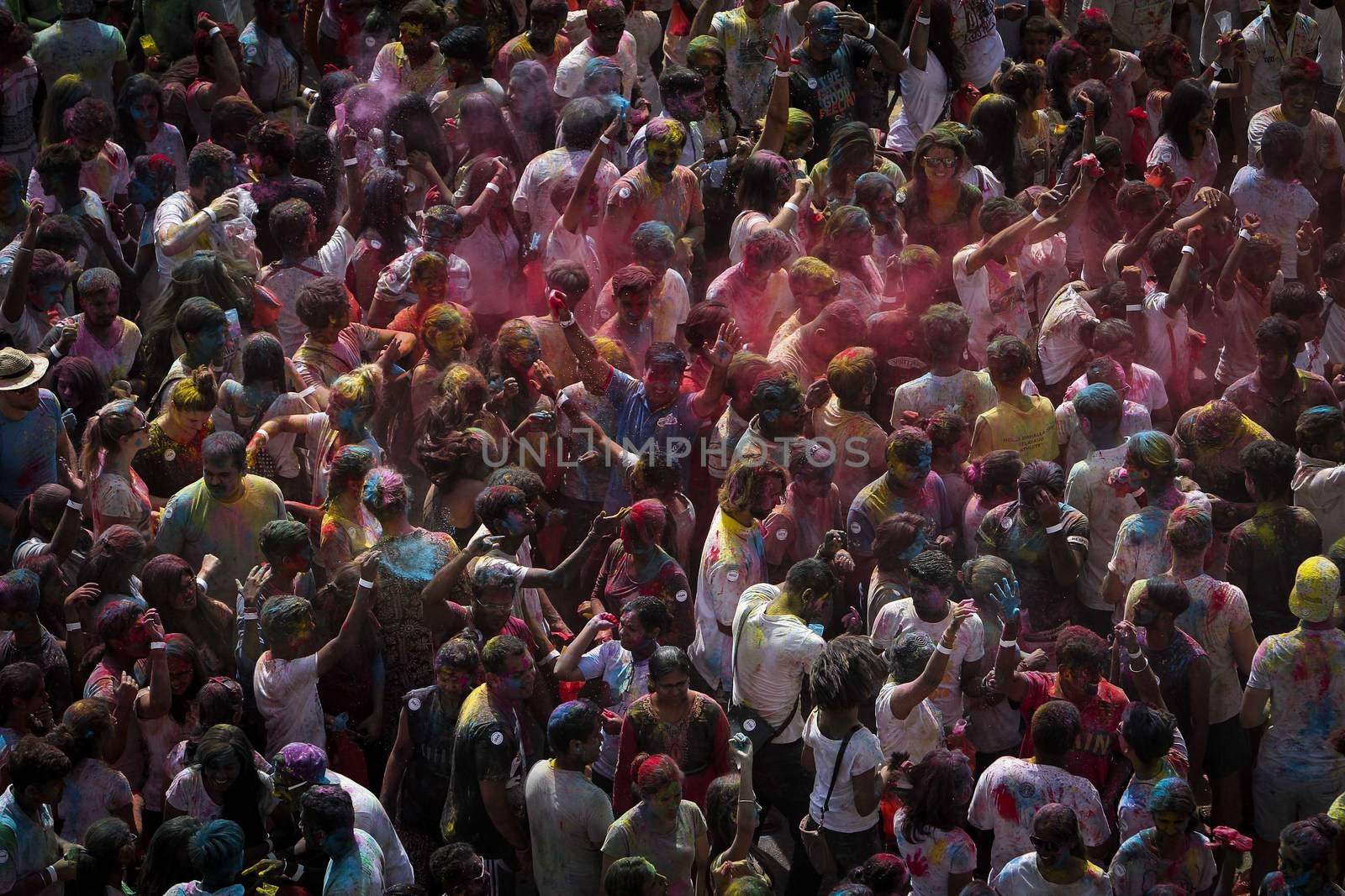 MALAYSIA, Kuala Lumpur: Revellers dance and spray colored powder during the Holi Festival in Kuala Lumpur on March 26, 2016. Holi, also called the Festival of Colours, is a popular Hindu spring festival observed in India, Malaysia and other countries at the end of the winter season on the last full moon day of the lunar month. 