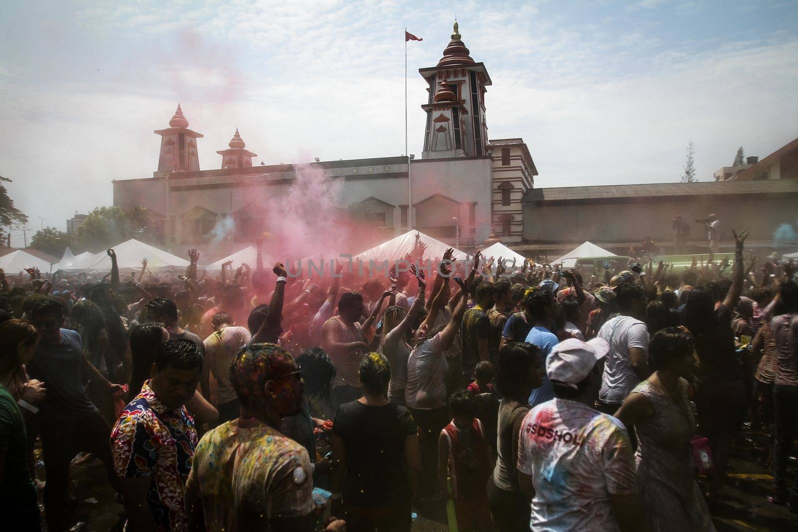MALAYSIA, Kuala Lumpur: Revellers dance and spray colored powder during the Holi Festival in Kuala Lumpur on March 26, 2016. Holi, also called the Festival of Colours, is a popular Hindu spring festival observed in India, Malaysia and other countries at the end of the winter season on the last full moon day of the lunar month. 